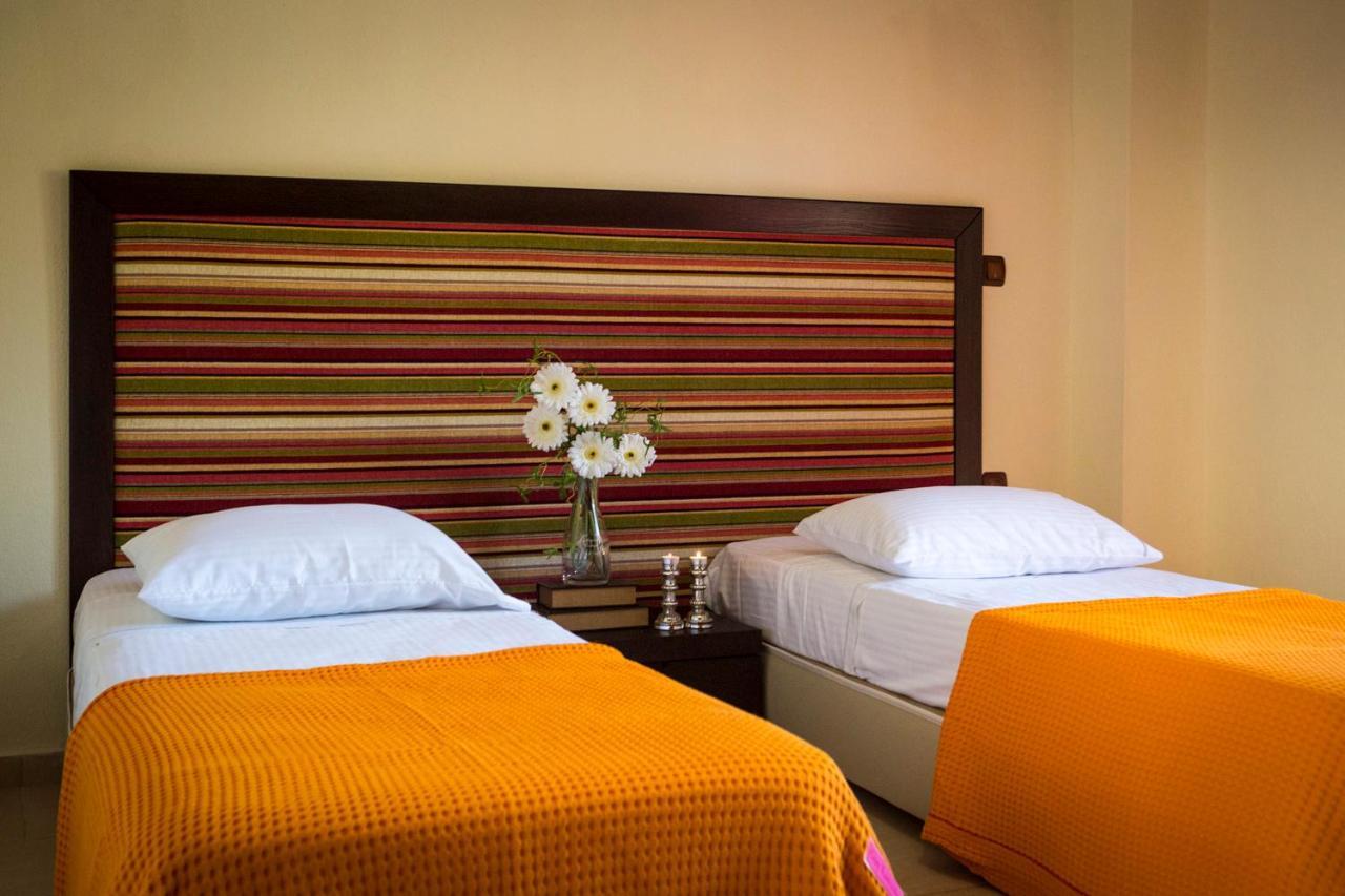 Stigmes Villas & Suites Nea Skioni Bagian luar foto